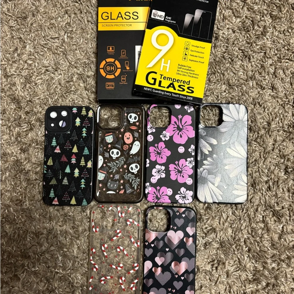 Assorted Patterned Phone Cases with Tempered Glass Screen Protectors.